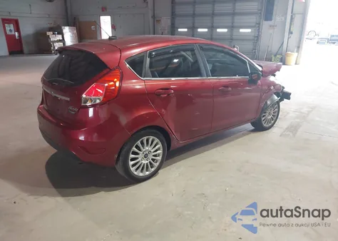 2015 Ford Fiesta Titanium z USA, uszkodzony, nr VIN 3FADP4FJ5FM117640